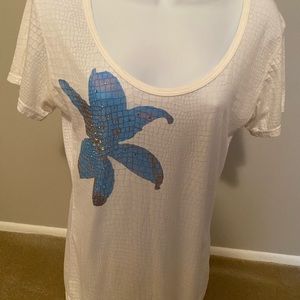 Cache Teez shirt size L.